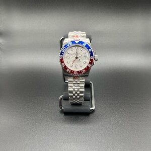 Luxury Silver Watch with Red and Blue Bezel